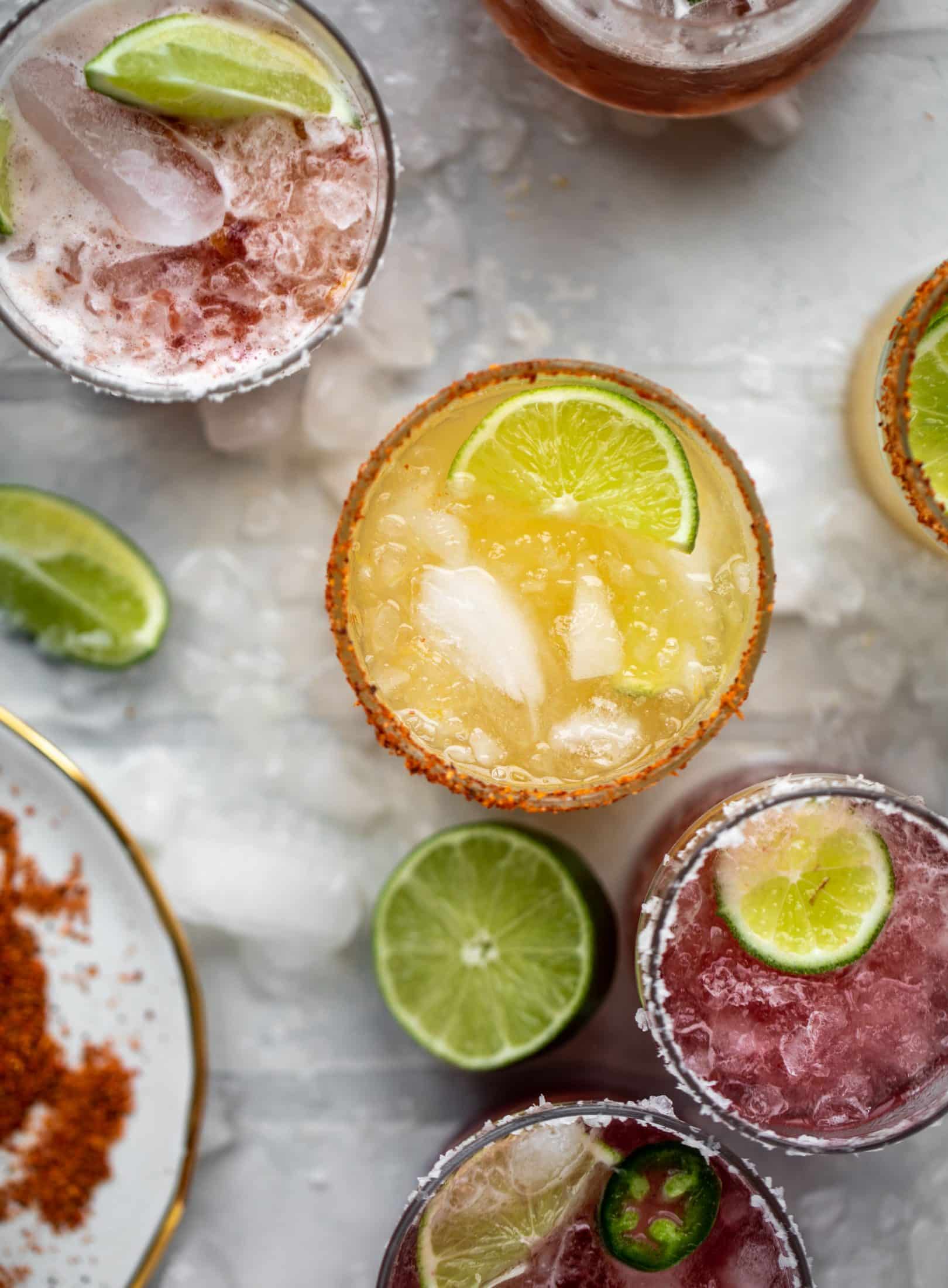 These bubbly jam margaritas are easy and delicious! Use your favorite jam instead of simple syrup to create a fruity flavor everyone will love.