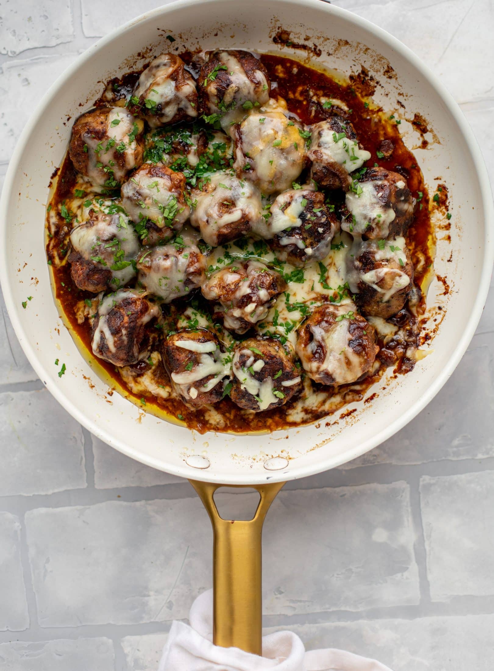 These french onion meatballs are super delicious! All the flavors of french onion soup made into juicy meatballs. Cheesy, saucy goodness!