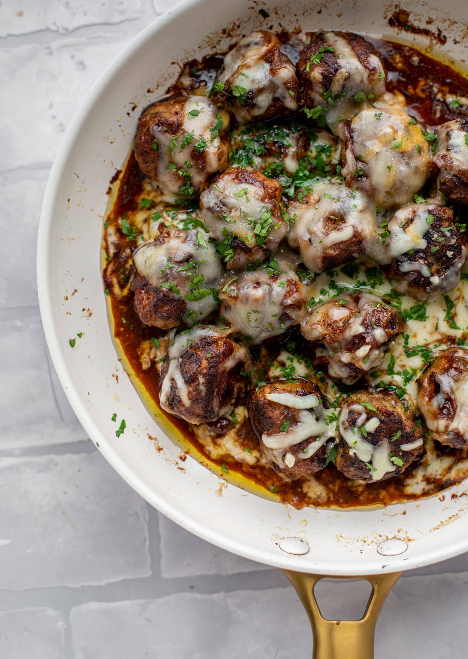 These french onion meatballs are super delicious! All the flavors of french onion soup made into juicy meatballs. Cheesy, saucy goodness!