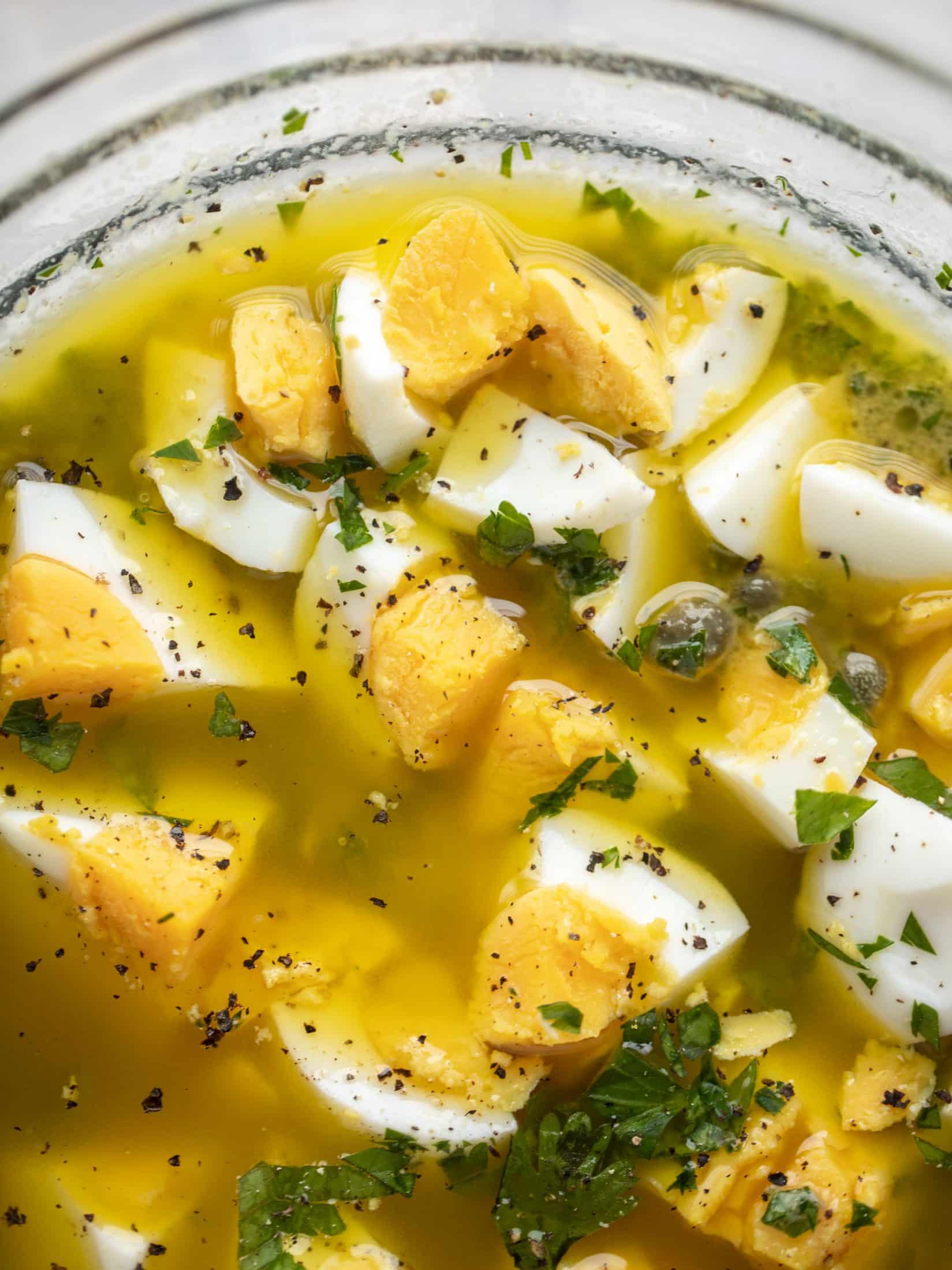 This hard boiled egg vinaigrette is a great way to use up leftover hard boiled eggs! It's fabulous on roasted vegetables, salads and toast.