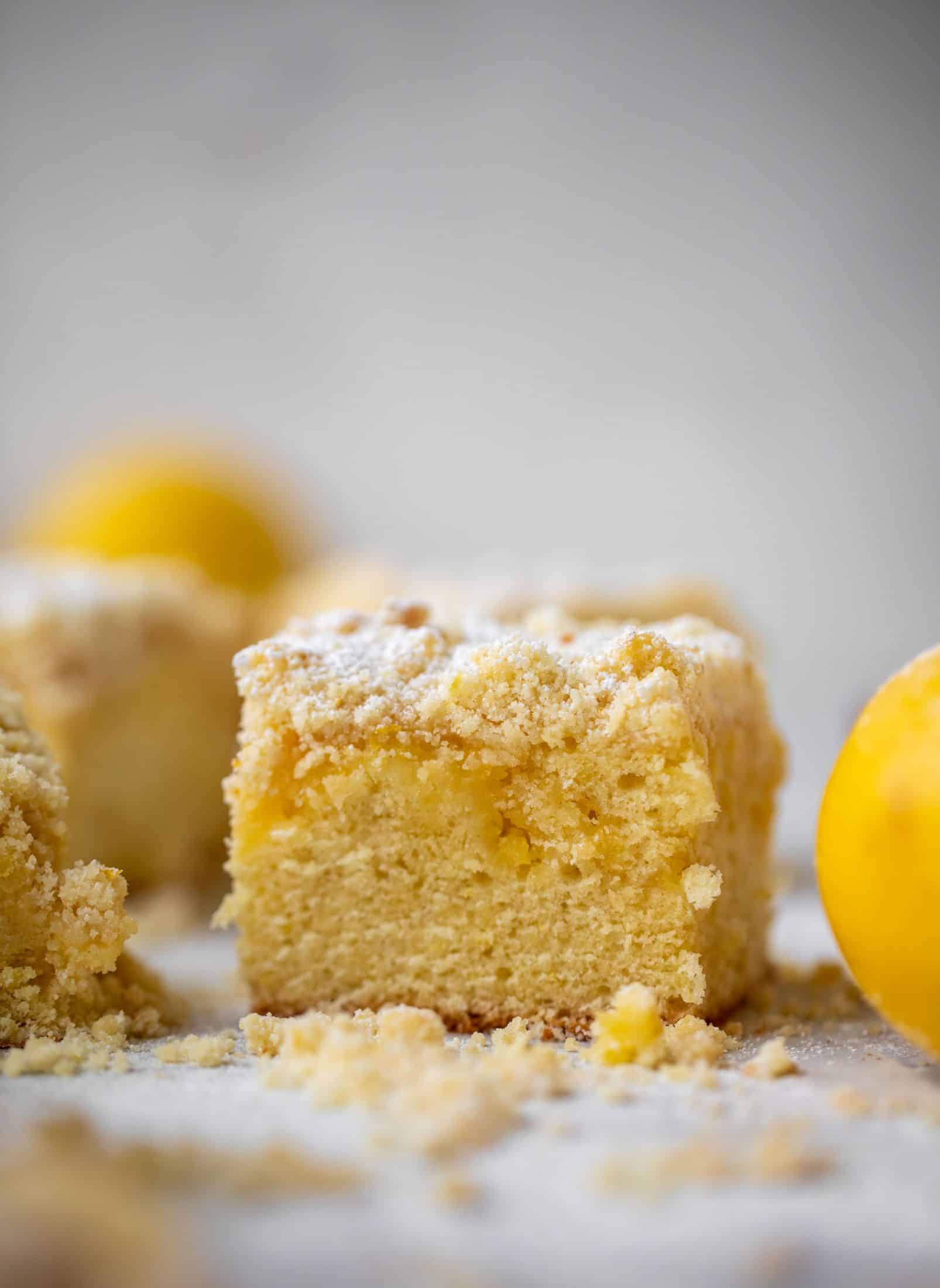 This lemon crumb cake is incredible! Lemon cake, lemon curd and lemon crumb come together for this delicious breakfast or dessert bite!