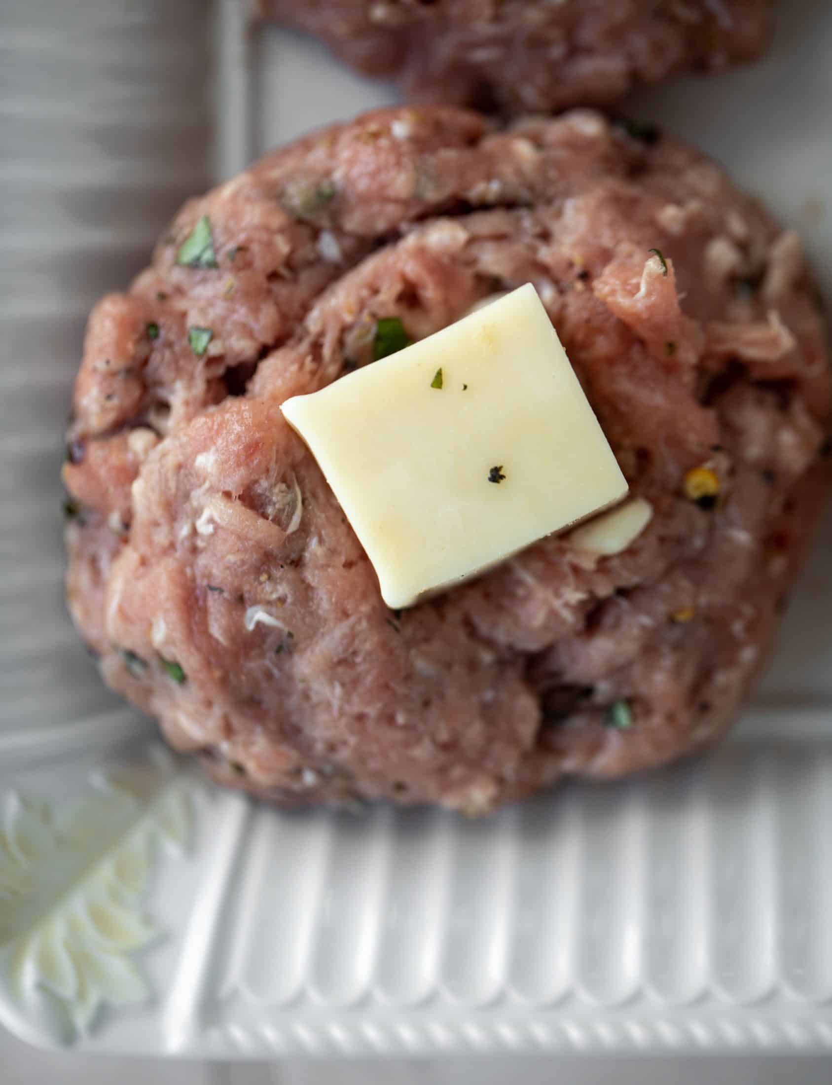 chicken burgers stuffed with mozzarella cheese