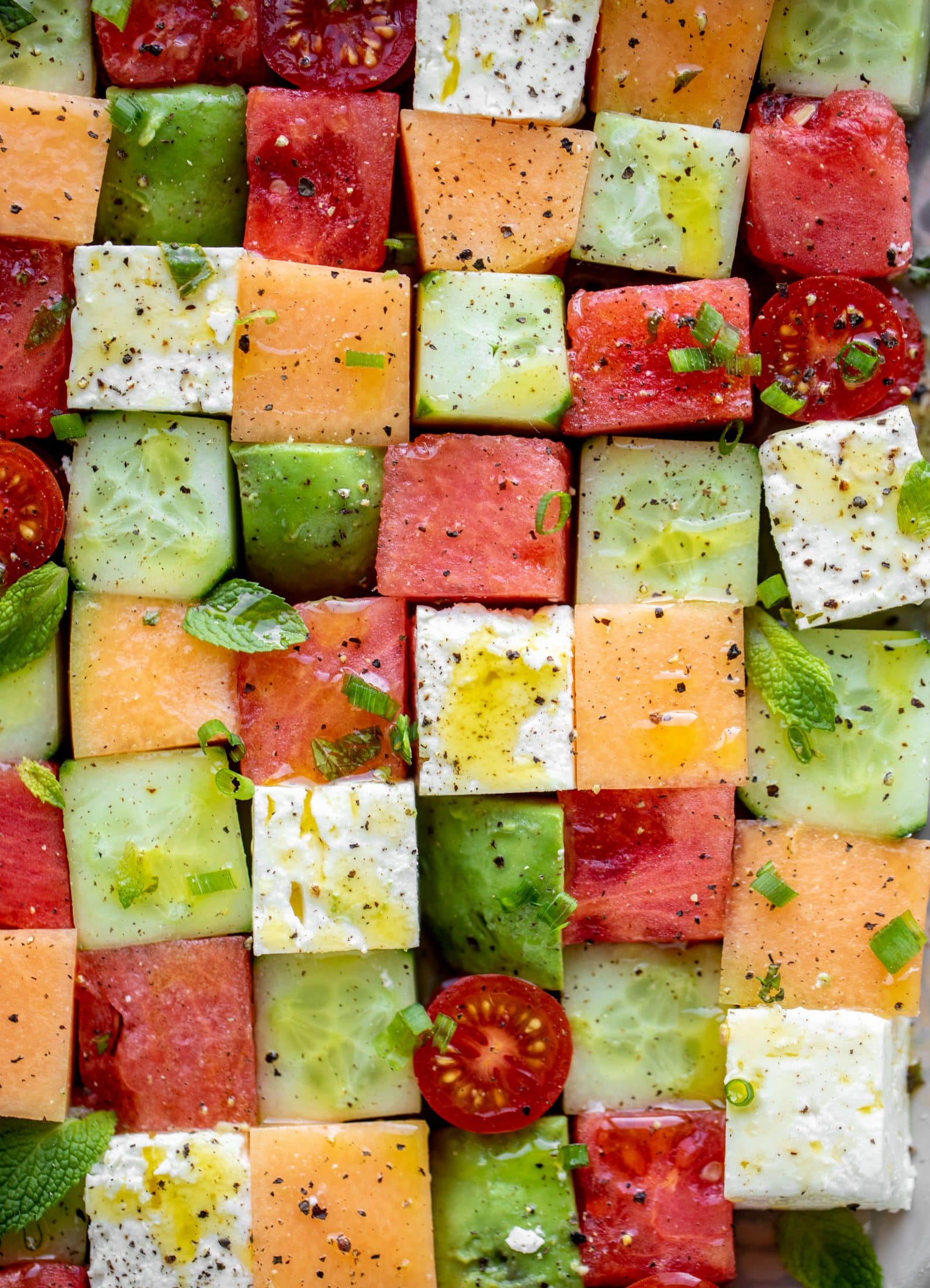 close up melon mosaic salad with hot honey vinaigrette