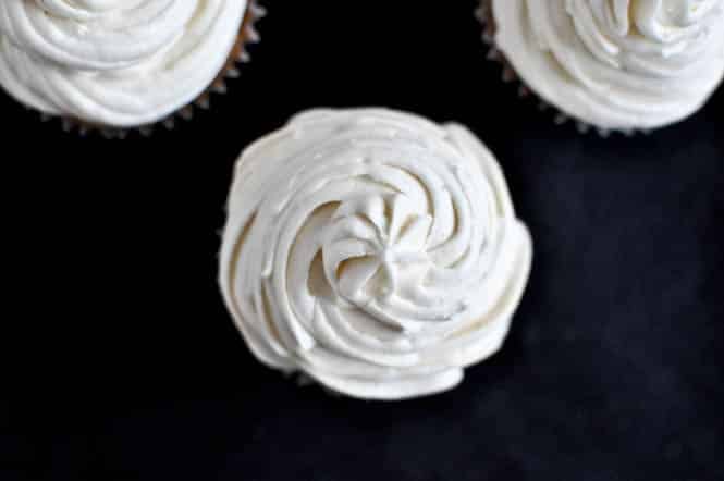 Sweet Potato Pie Cupcakes with Marshmallow Frosting I howsweeteats.com Sweet Potato Pie Cupcakes with Marshmallow Frosting I howsweeteats.com