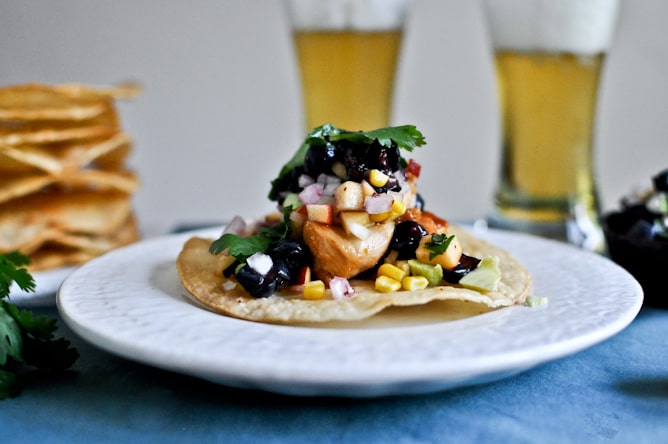 Sweet + Spicy Glazed Chicken, Corn + Avocado Tostadas with Blueberry Peach Salsa I howsweeteats.com Sweet + Spicy Glazed Chicken, Corn + Avocado Tostadas with Blueberry Peach Salsa I howsweeteats.com