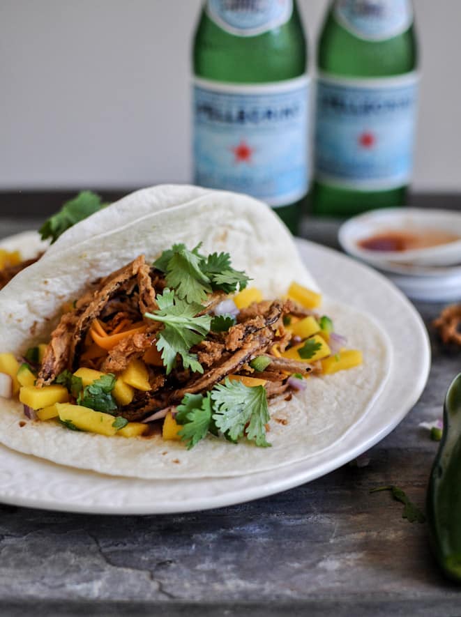 Crockpot BBQ Beer Pulled Pork Tacos with Crispy Onion Straws and Mango Salsa I howsweeteats.com