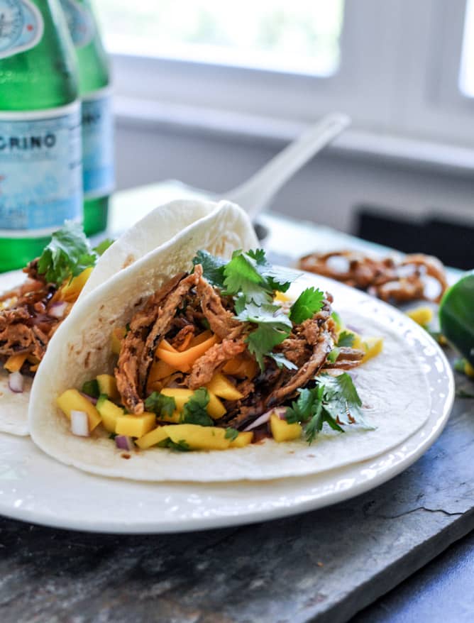 Crockpot BBQ Beer Pulled Pork Tacos with Crispy Onion Straws and Mango Salsa I howsweeteats.com