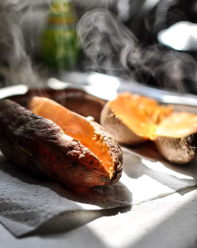 Smoky Sweet Potato Burgers with Roasted Garlic Cream and Avocado I howsweeteats.com Smoky Sweet Potato Burgers with Roasted Garlic Cream and Avocado I howsweeteats.com