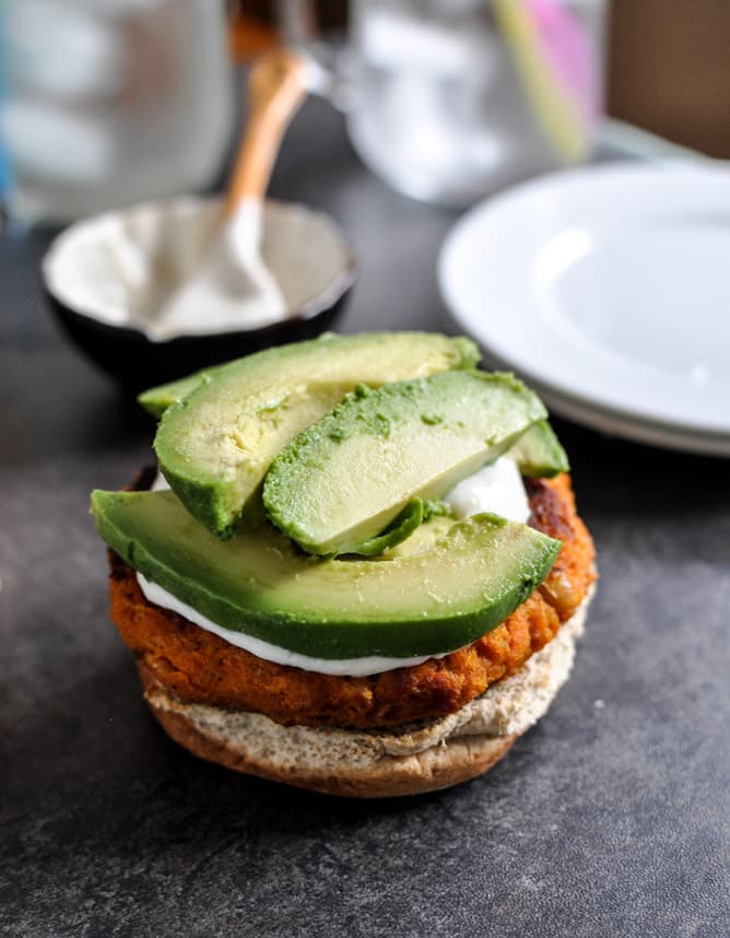 Smoky Sweet Potato Burgers with Roasted Garlic Cream and Avocado I howsweeteats.com Smoky Sweet Potato Burgers with Roasted Garlic Cream and Avocado I howsweeteats.com