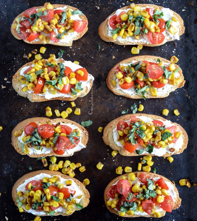 Summer Crostini with Whipped Roasted Garlic Goat Cheese I howsweeteats.com Summer Crostini with Whipped Roasted Garlic Goat Cheese I howsweeteats.com