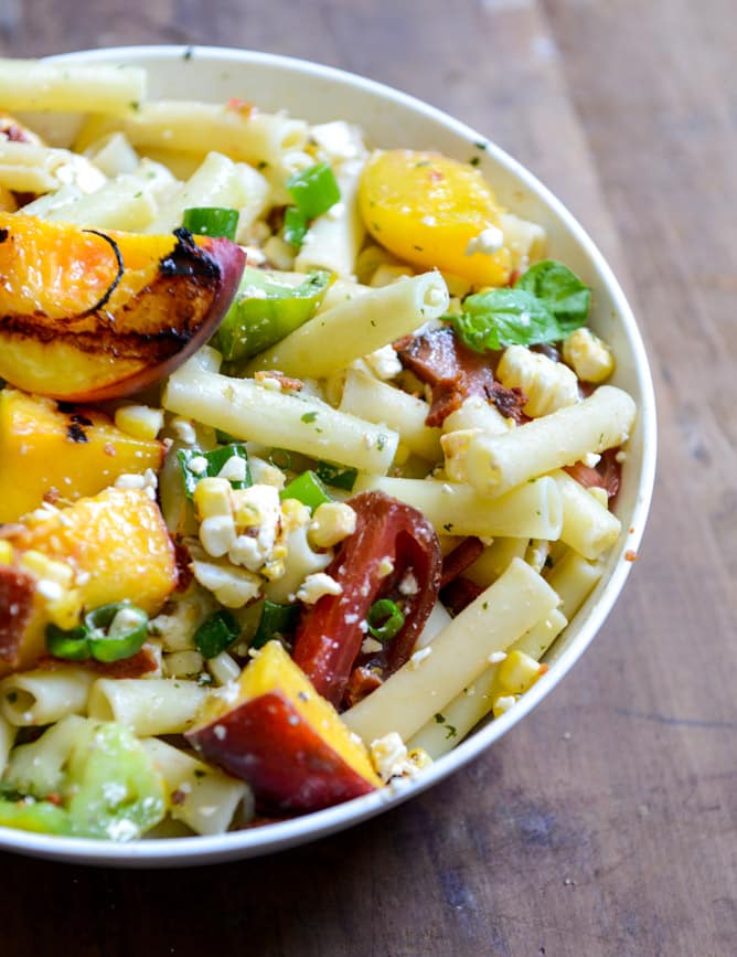 Smoky Heirloom Tomato and Grilled Peach Pasta Salad with Basil Vinaigrette I howsweeteats.com