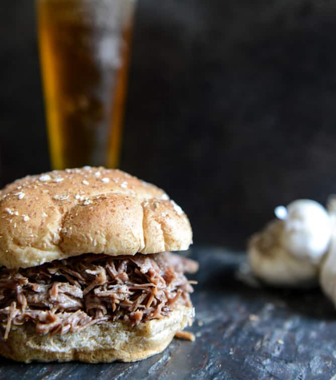 Crockpot Brown Sugar + Roasted Garlic Pulled Pot Roast Sandwiches I howsweeteats.com