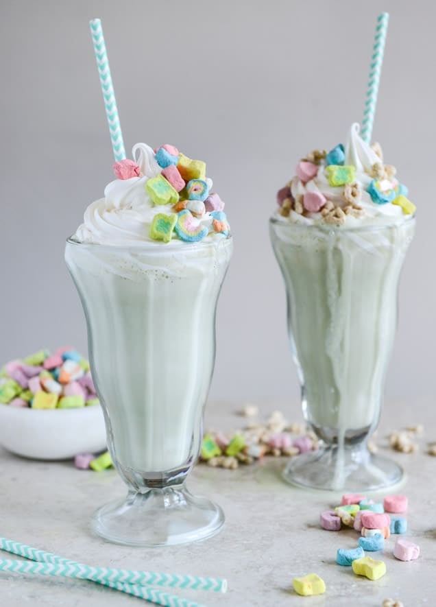 Boozy Lucky Charms Cereal Milkshakes with Marshmallow Frosting I howsweeteats.com Boozy Lucky Charms Cereal Milkshakes with Marshmallow Frosting I howsweeteats.com