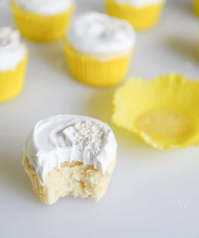 Fluffy Lemon Cupcakes with Whipped Coconut Cream I howsweeteats.com