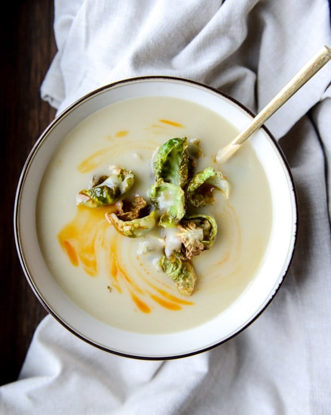 creamy roasted garlic potato soup with crispy brussels I howsweeteats.com