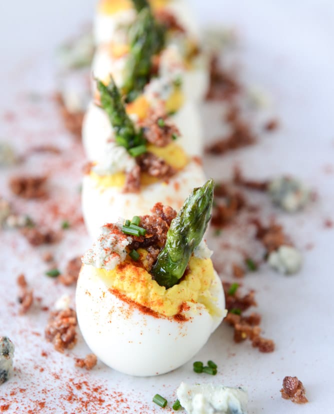 bacon blue deviled eggs with roasted garlic and asparagus I howsweeteats.com