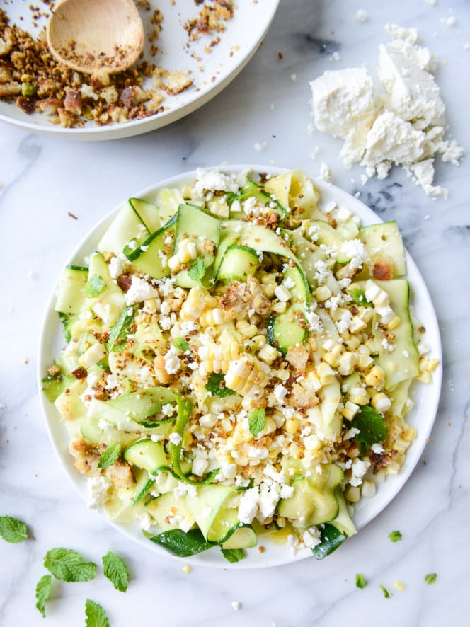 marinated zucchini feta salad with fresh corn and toasted pistachio breadcrumbs I howsweeteats.com