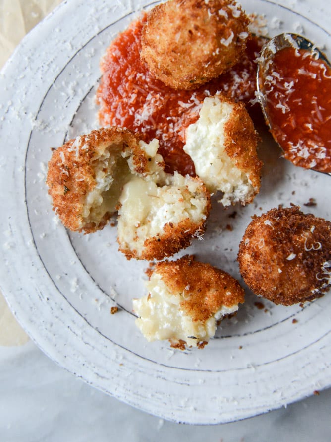 fontina, roasted garlic and goat cheese arancini I howsweeteats.com