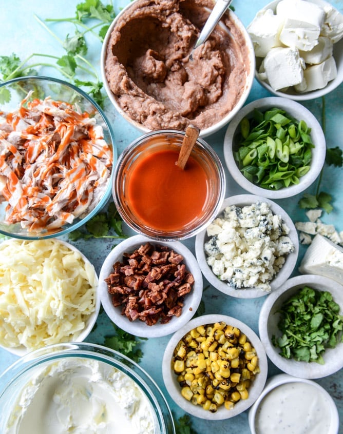 layered buffalo chicken dip I howsweeteats.com