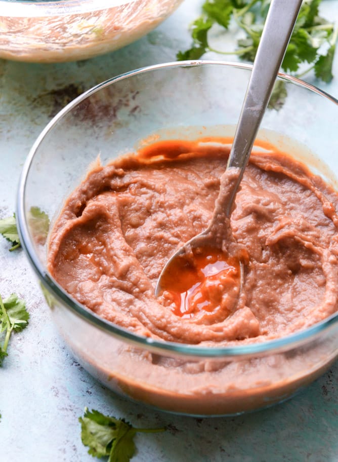 layered buffalo chicken dip I howsweeteats.com