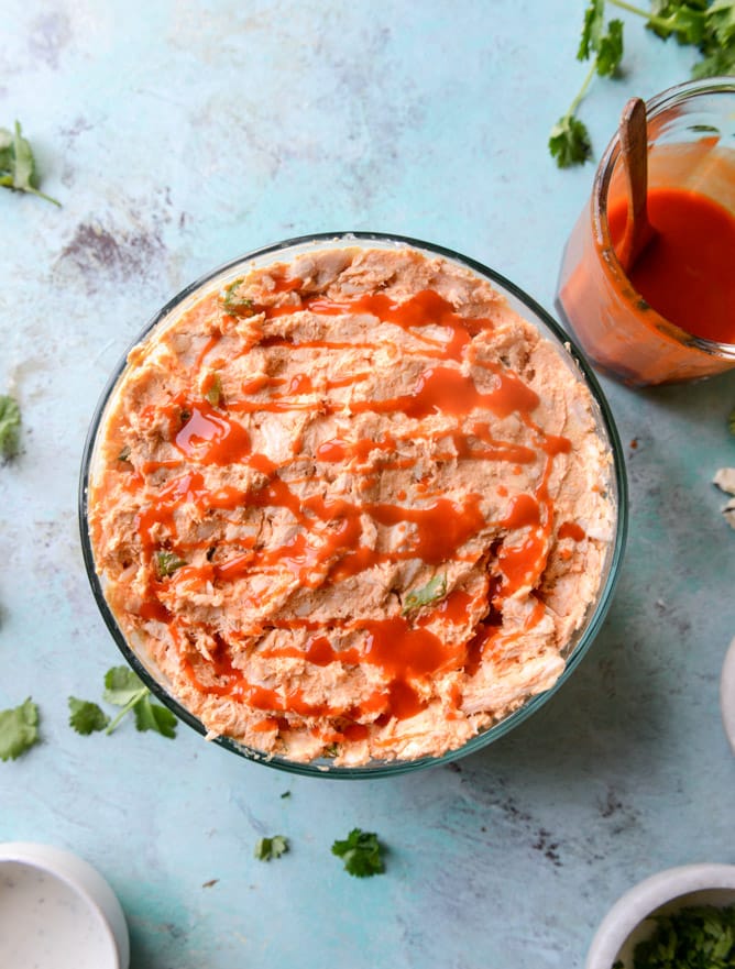 layered buffalo chicken dip I howsweeteats.com