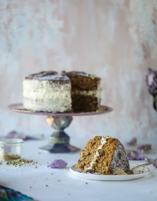 pistachio carrot cake with cream cheese frosting I howsweeteats.com #carrotcake #pistachio #cake #creamcheese #frosting