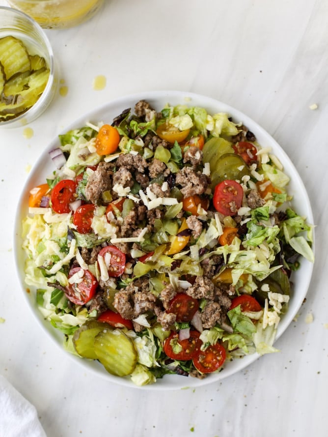 cheeseburger chopped salad I howsweeteats.com #cheeseburger #chopped #salad #dill #pickle #dressing