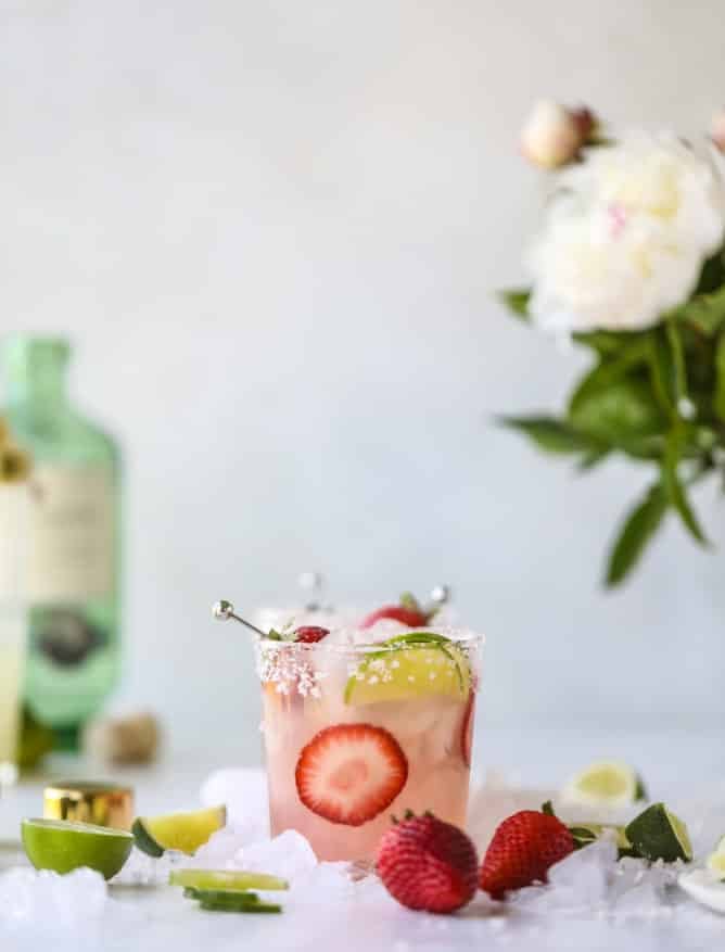 smoked strawberry mezcal margaritas I howsweeteats.com #margaritas #mezcal #strawberry #lime
