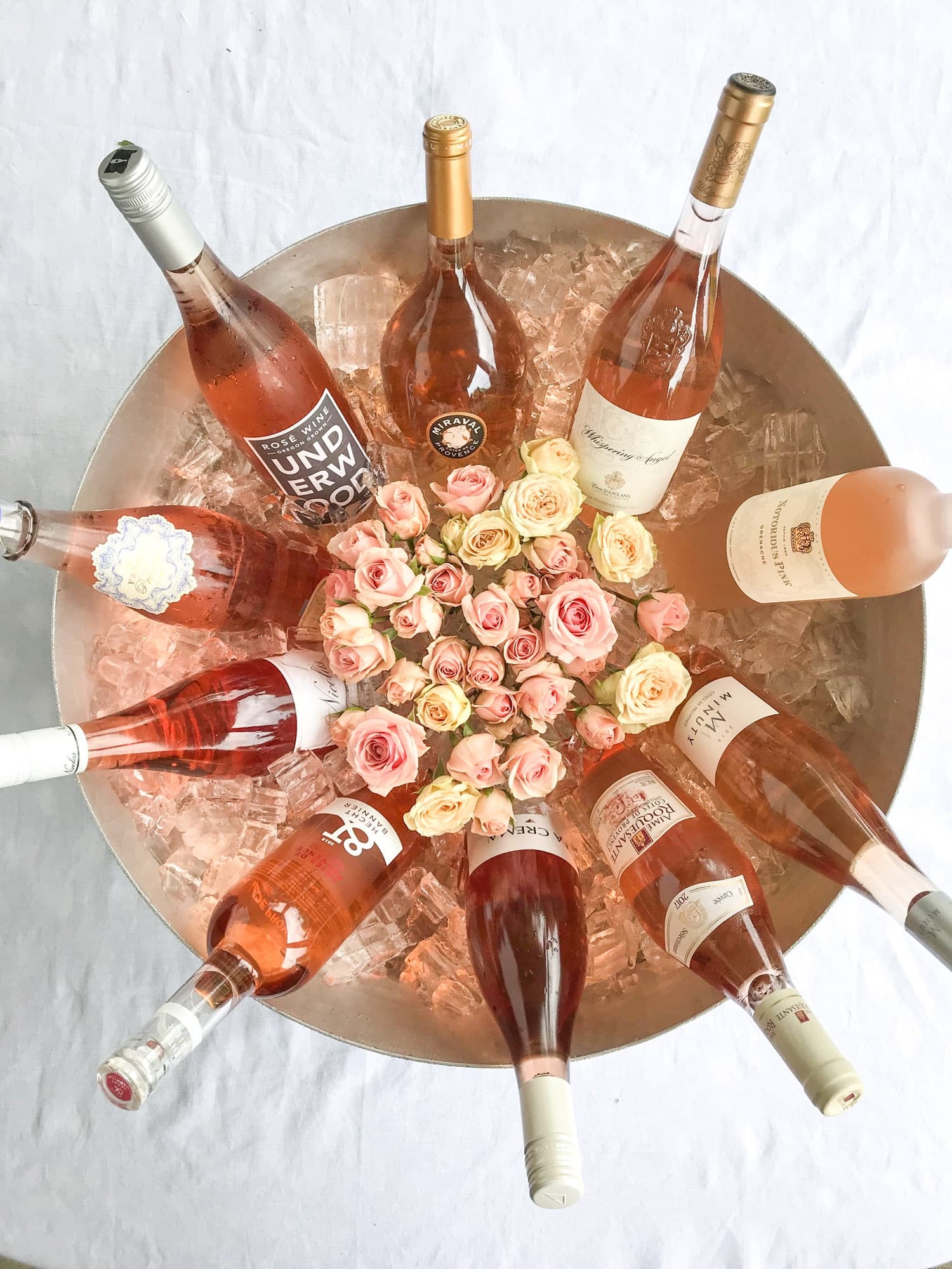 The best rosé to drink - all here in one epic summer guide for you! I'm sharing my personal favorite top ten rosé wines to drink in summer 2018, along with the perfect cheese board and snacks to go with. I howsweeteats.com #rosé #rose #summer #2018 #cheeseboard 