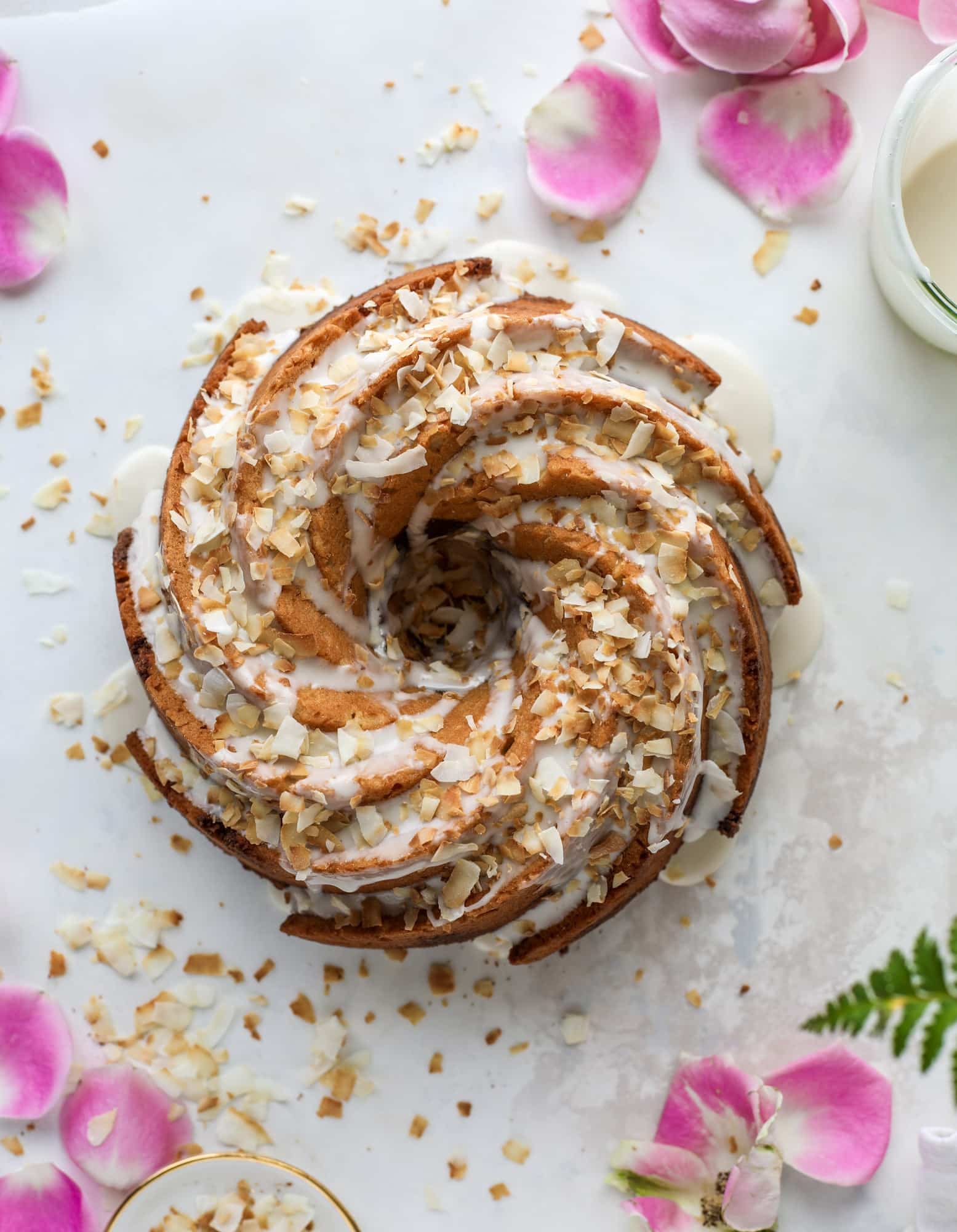 Make breakfast and brunch better with coconut coffee cake! Tender coconut cake with a cocoa sugar streusel and a coconut glaze. To die for!