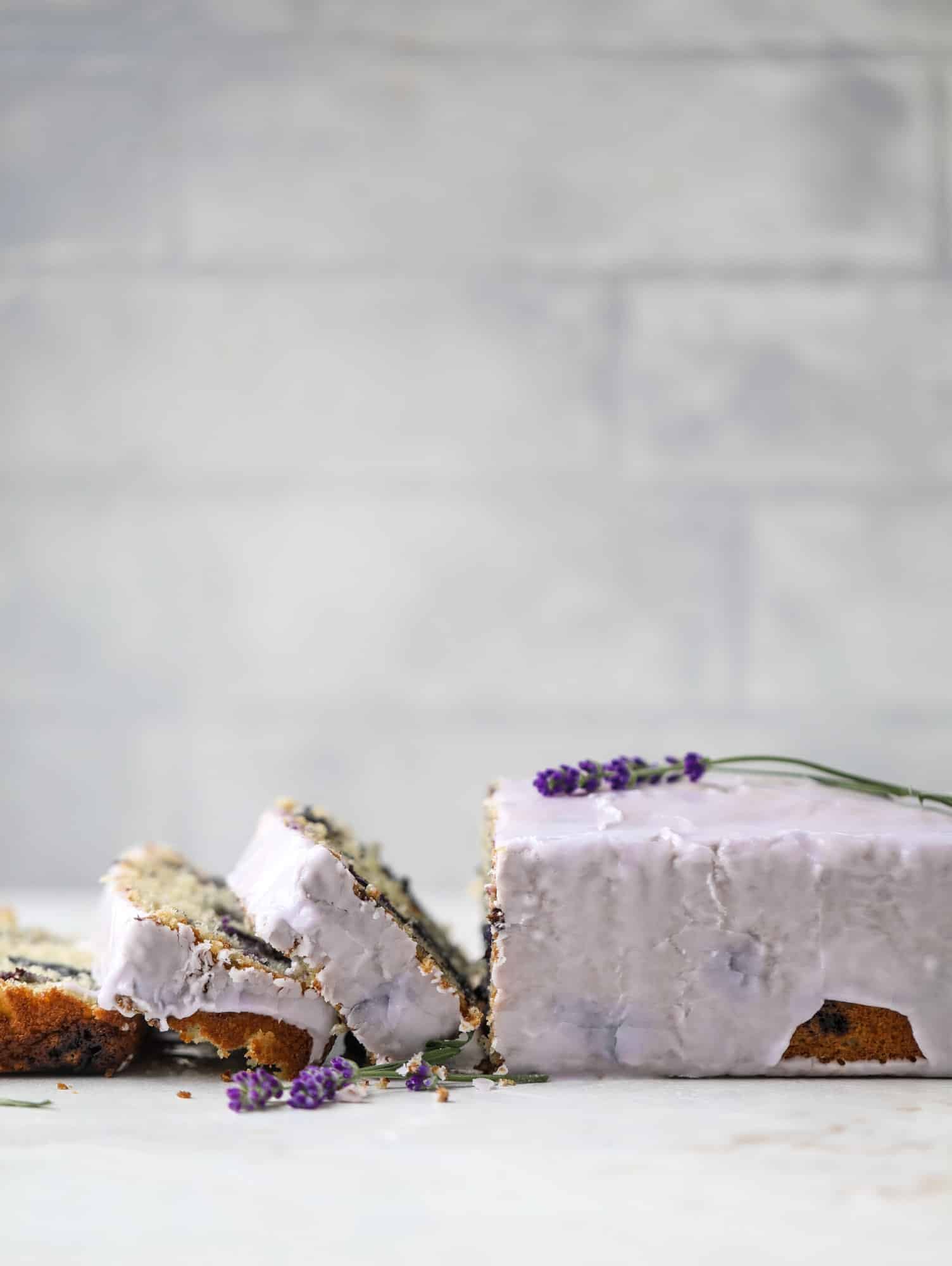 This lovely blueberry ricotta cake is covered in a lavender glaze and the perfect recipe for blueberry season! It's rich and light and super flavorful.