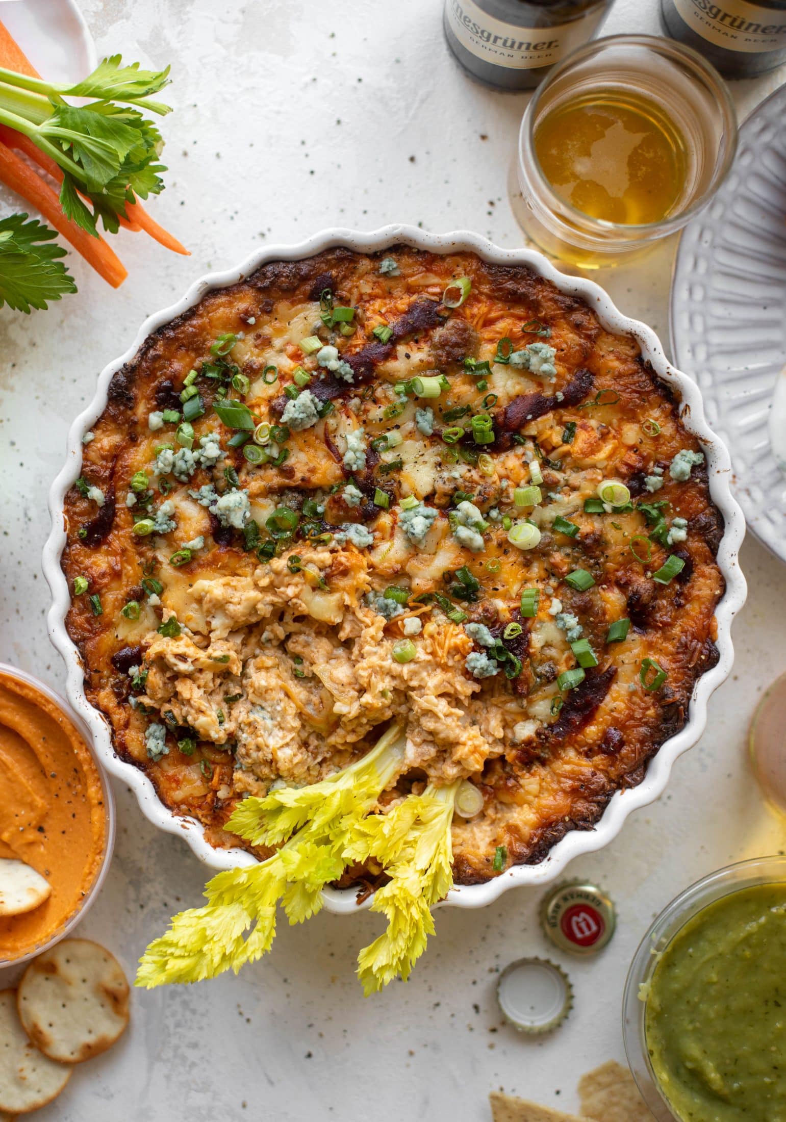 This loaded wing dip is full of buffalo wing sauce, BBQ sauce, honey mustard, ranch, blue cheese and tons of cheddar. All the flavors!