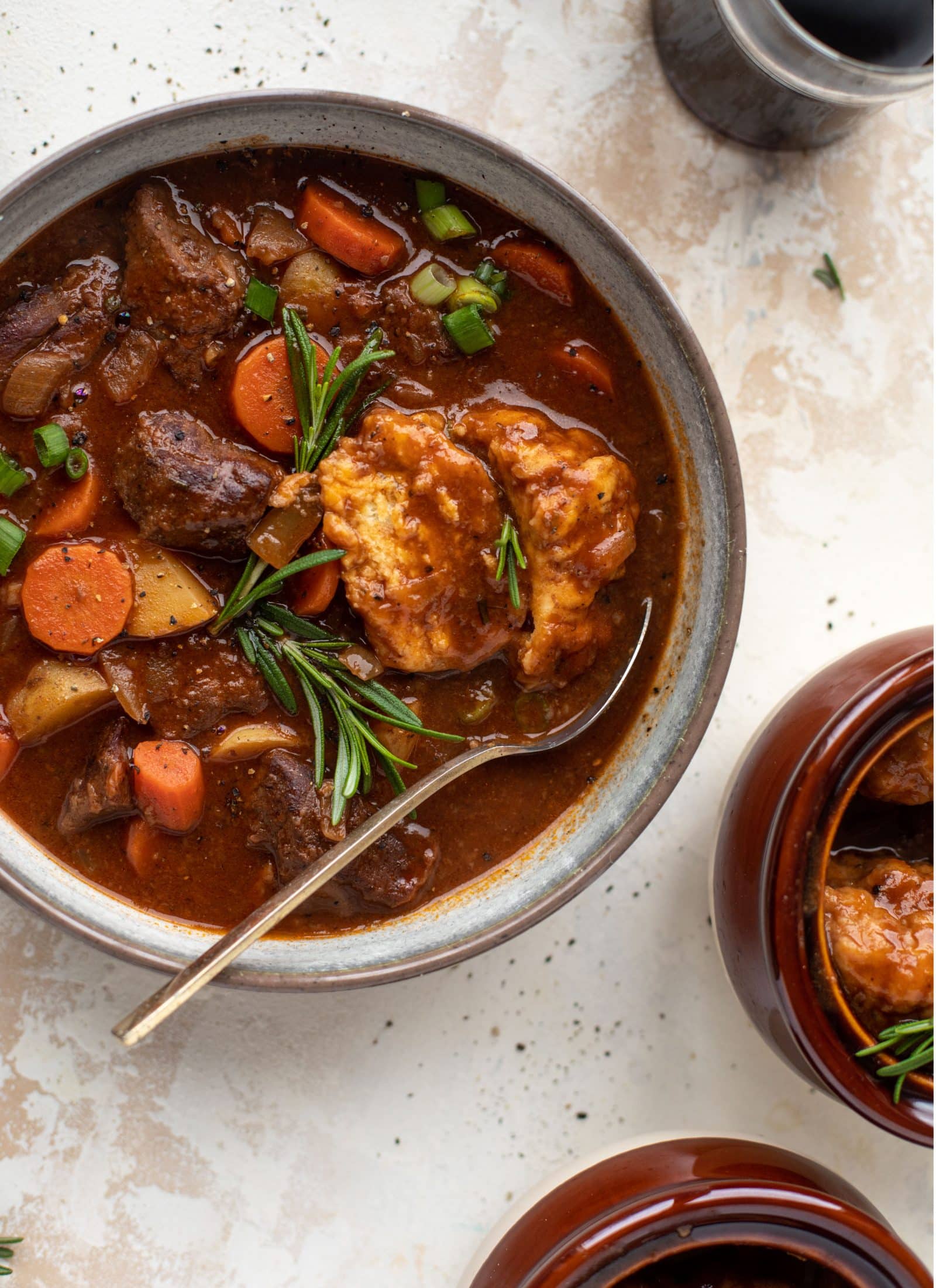 My new favorite soup! Irish stout beef stew is flavorful and hearty and topped with delicious herb dumplings. Perfect comfort food.