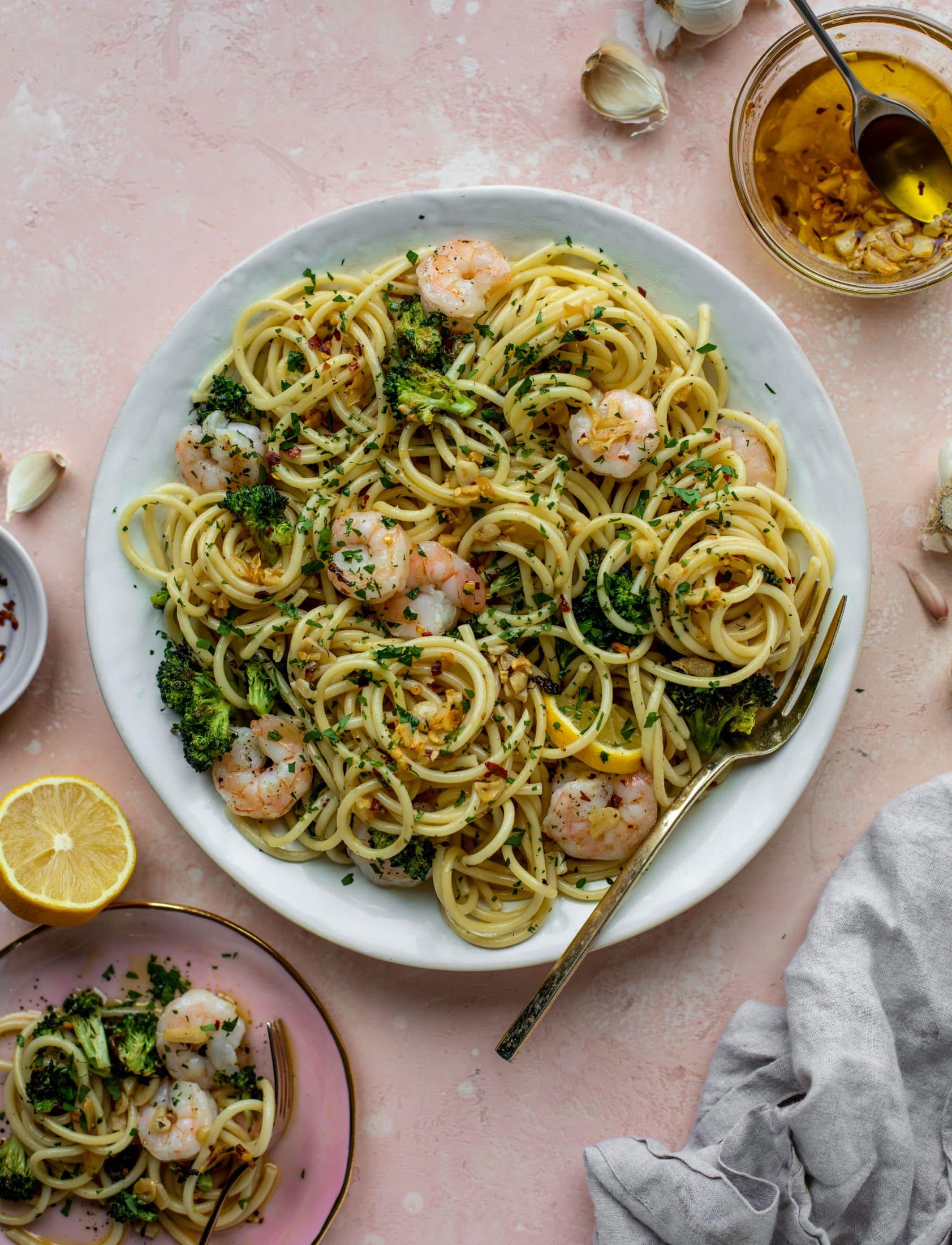 This garlic sauce pasta is incredible! Roasted shrimp and broccoli twirled with garlic oil noodles and crushed red pepper. Divine!