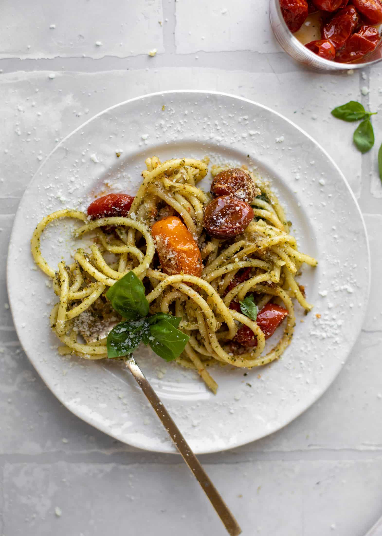 fork twirling baked pesto pasta