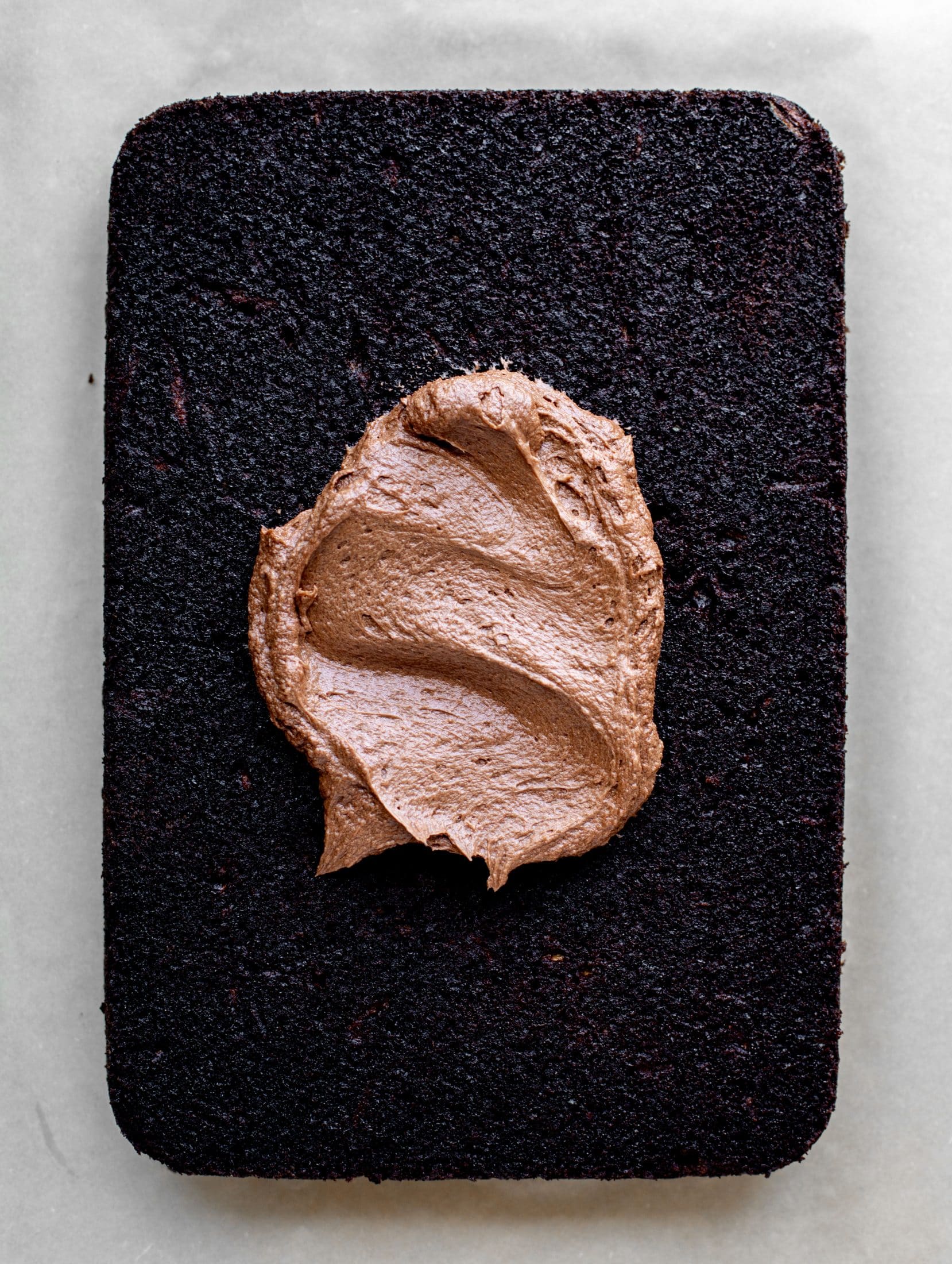 frosting on chocolate zucchini sheet cake