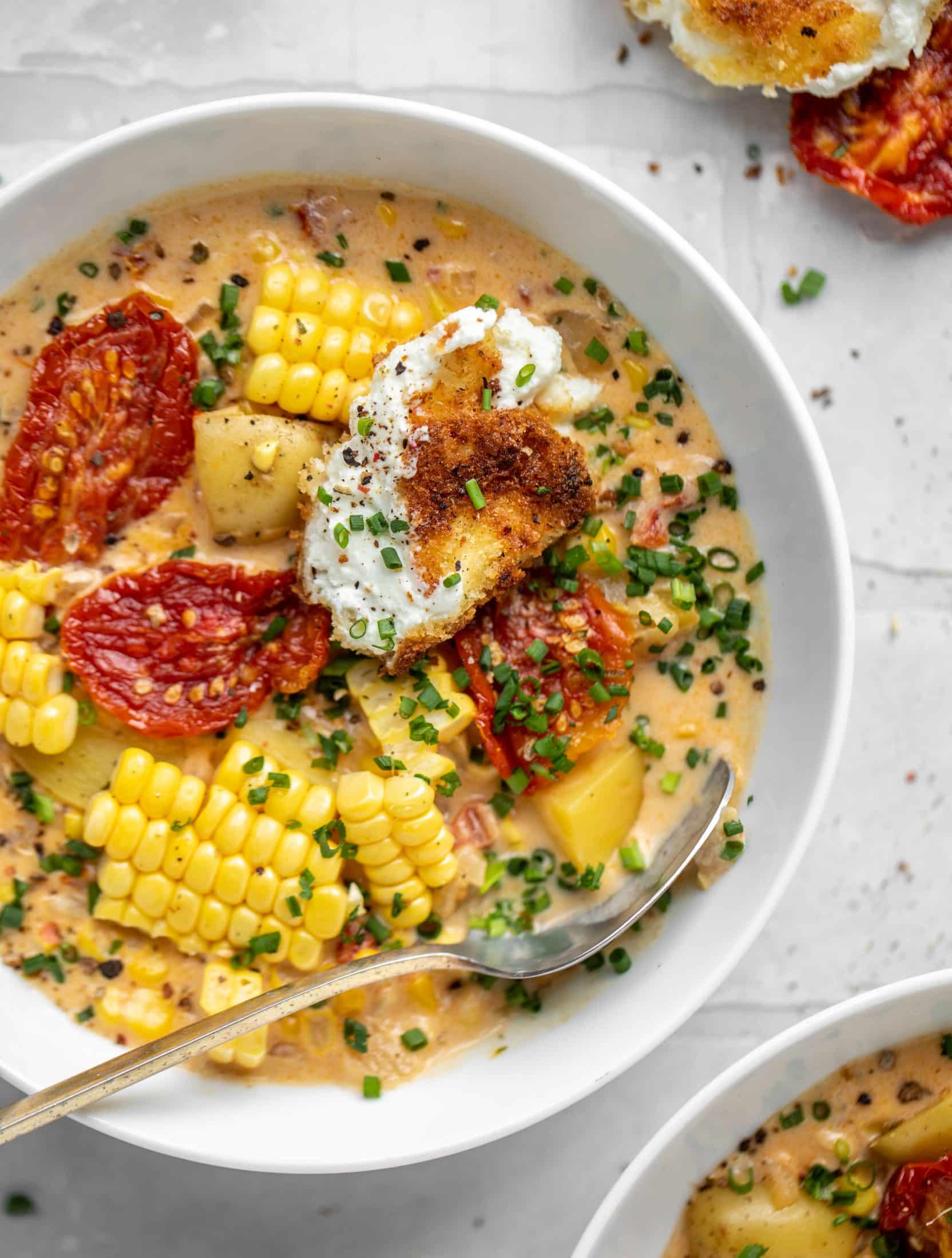 sun dried tomato corn chowder with crispy goat cheese