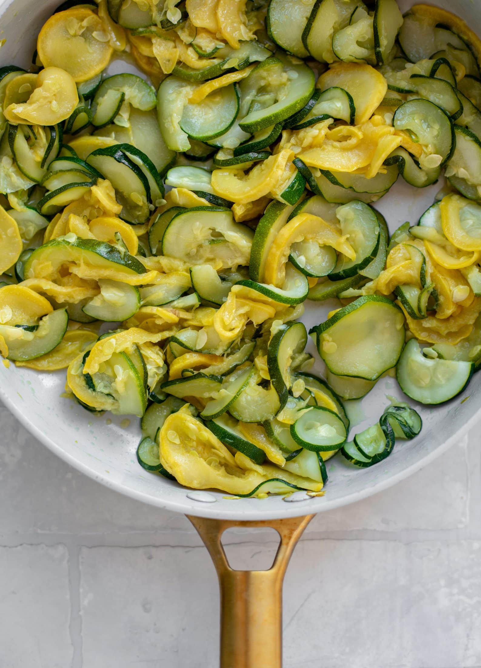 summer squash and zucchini in a skillet