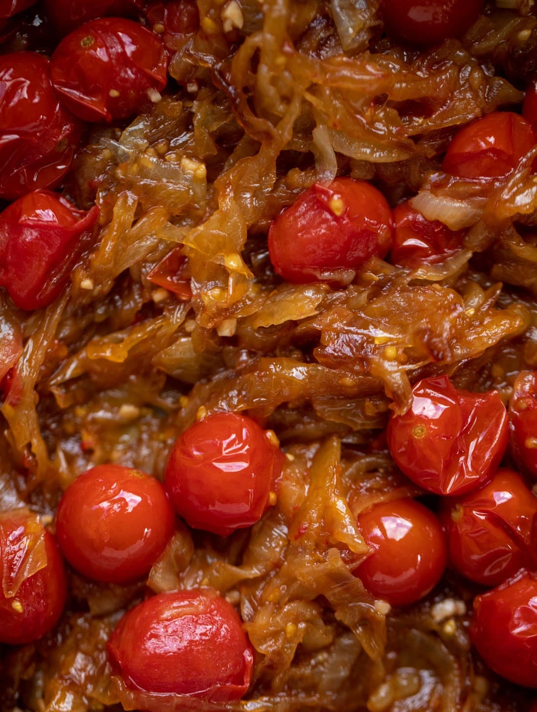 caramelized onions and burst cherry tomatoes