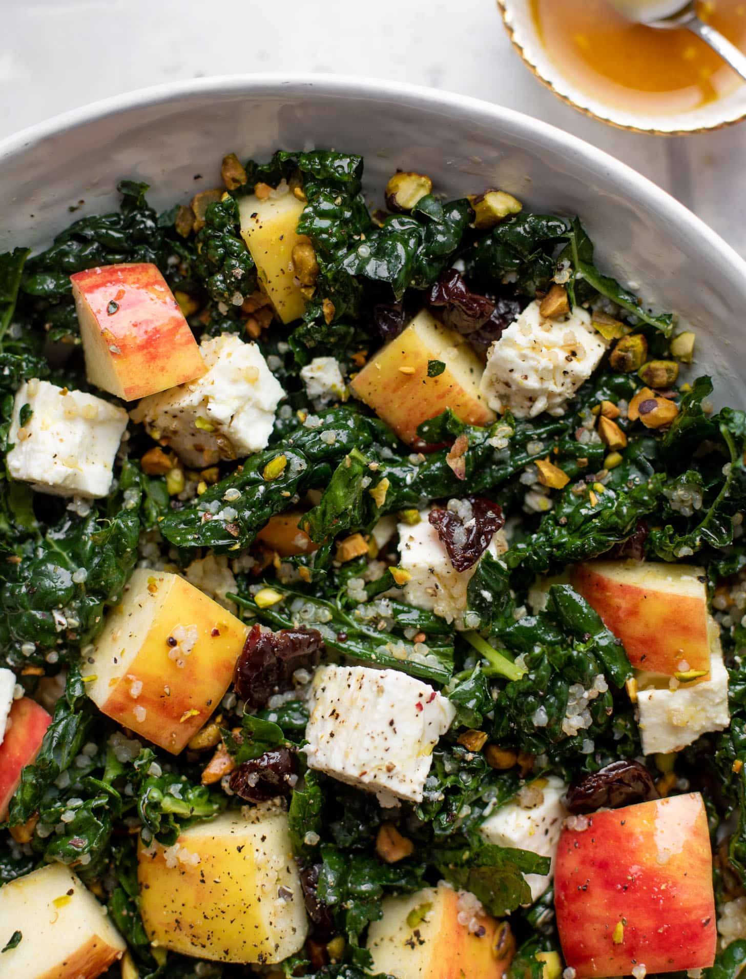 honeycrisp quinoa salad with kale and pistachios