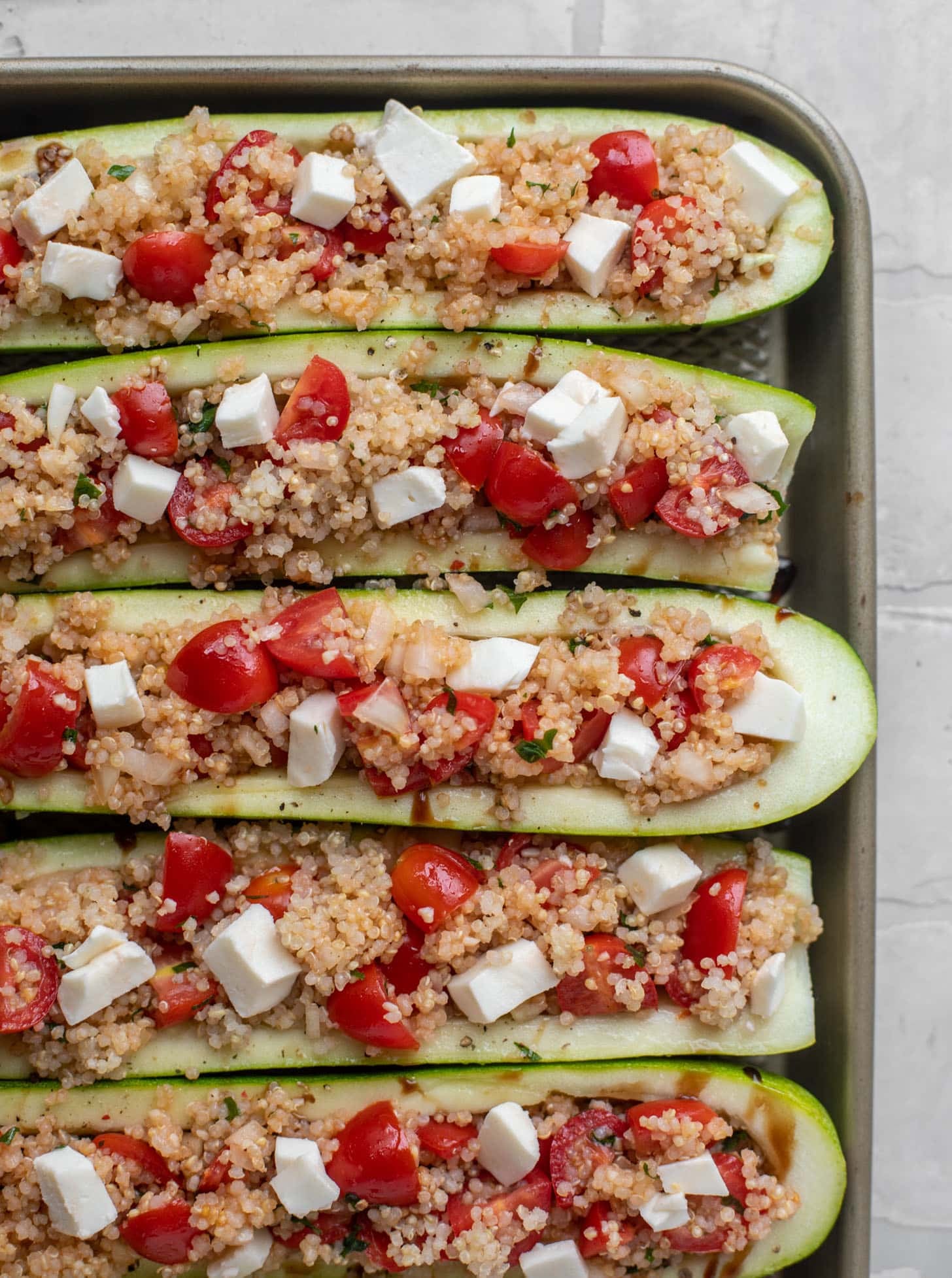 bruschetta quinoa zucchini boats before baking
