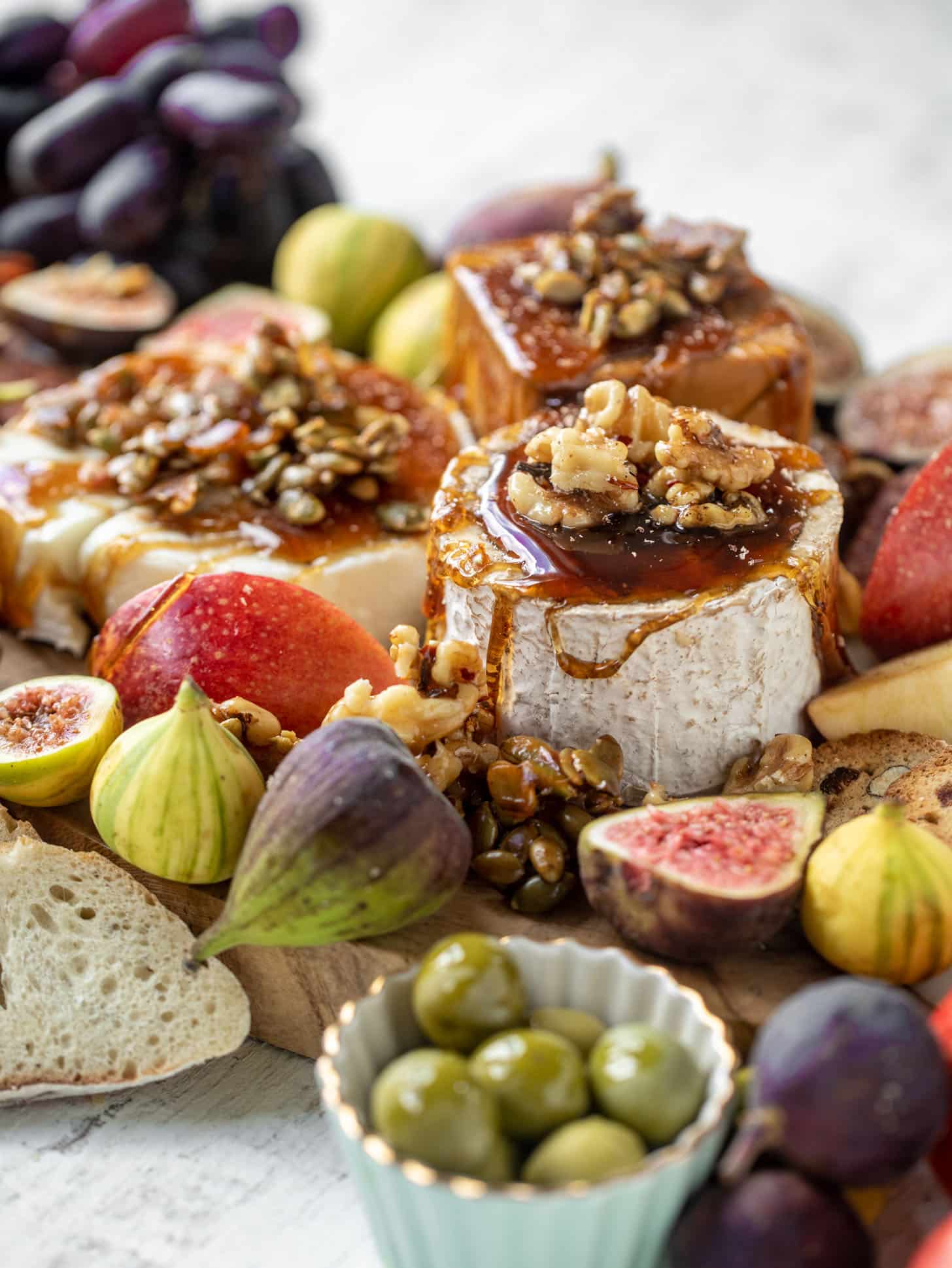 autumn cheese board with bourbon crackling caramel and honey roasted pepitas