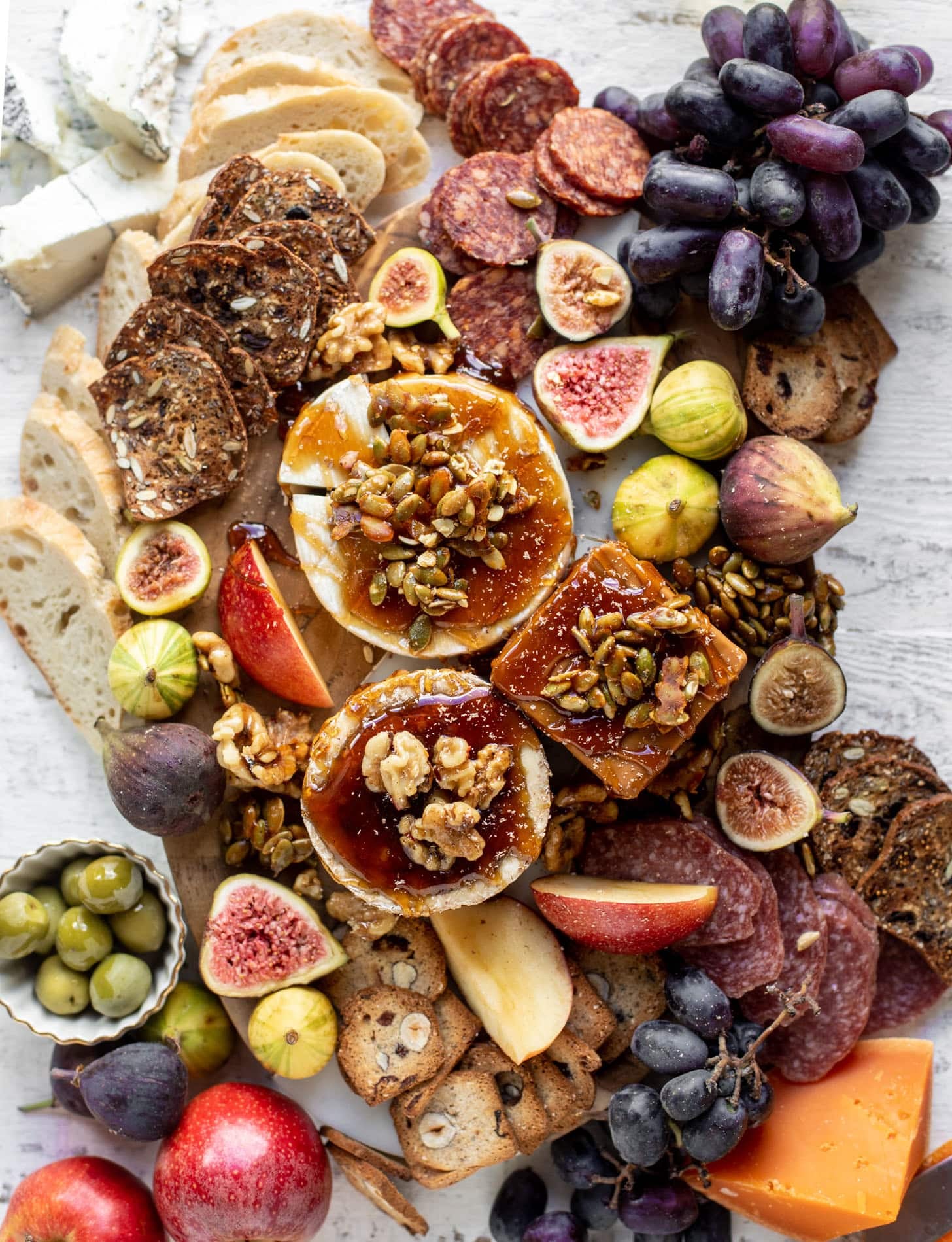 autumn cheese board with bourbon crackling caramel and honey roasted pepitas