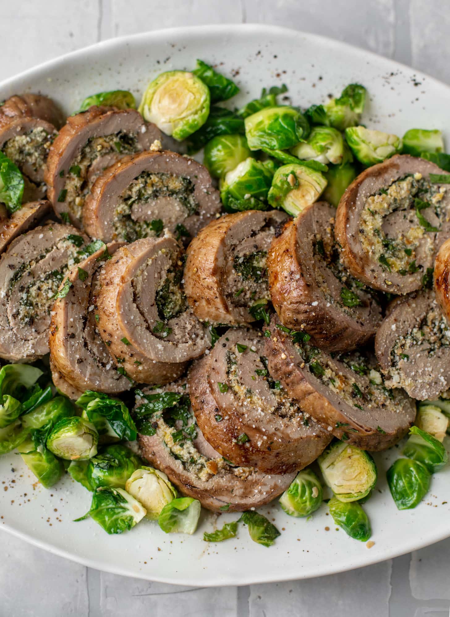 parmesan pistachio stuffed pork tenderloin with brussels sprouts
