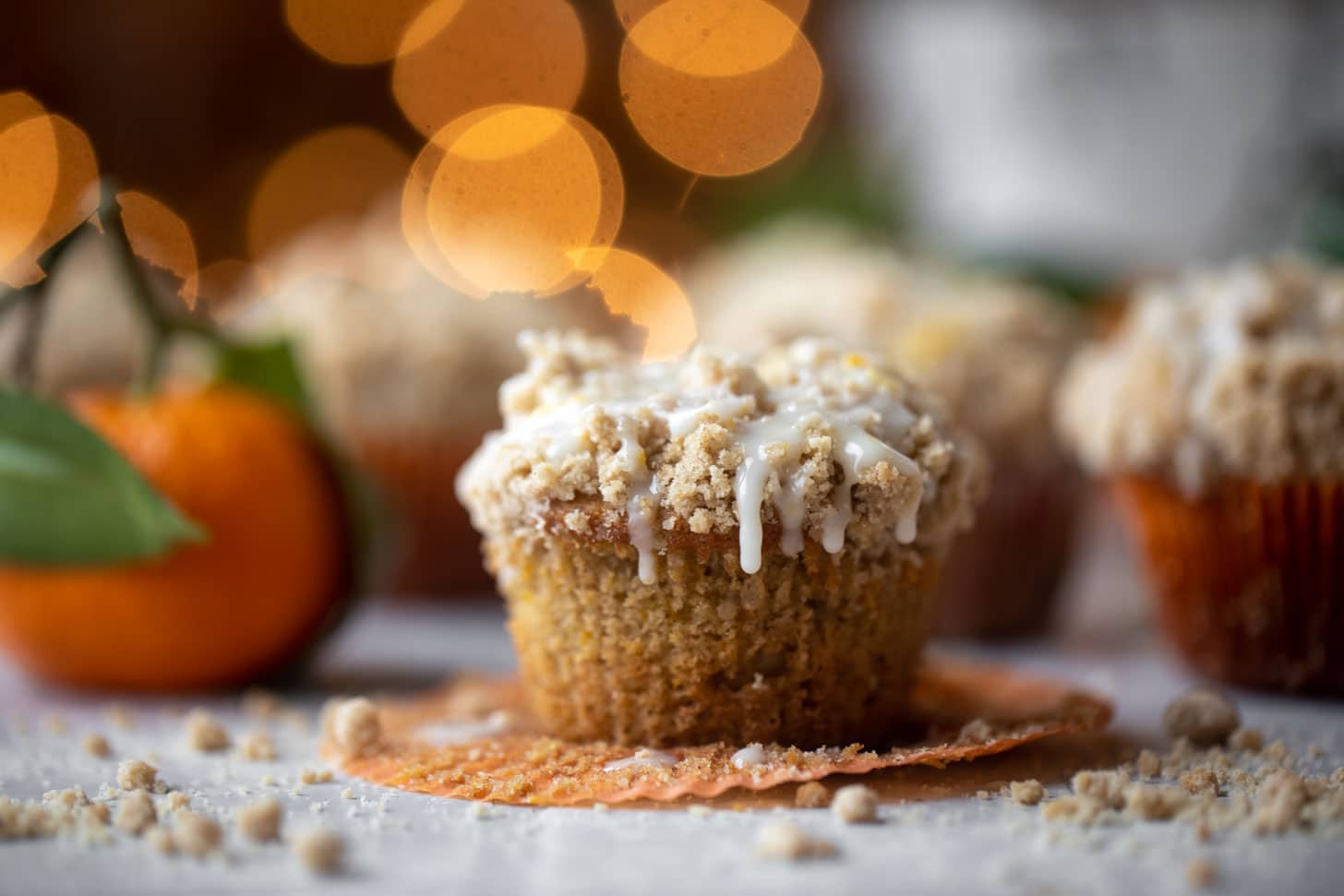 orange cinnamon coffee cake muffins with orange glaze