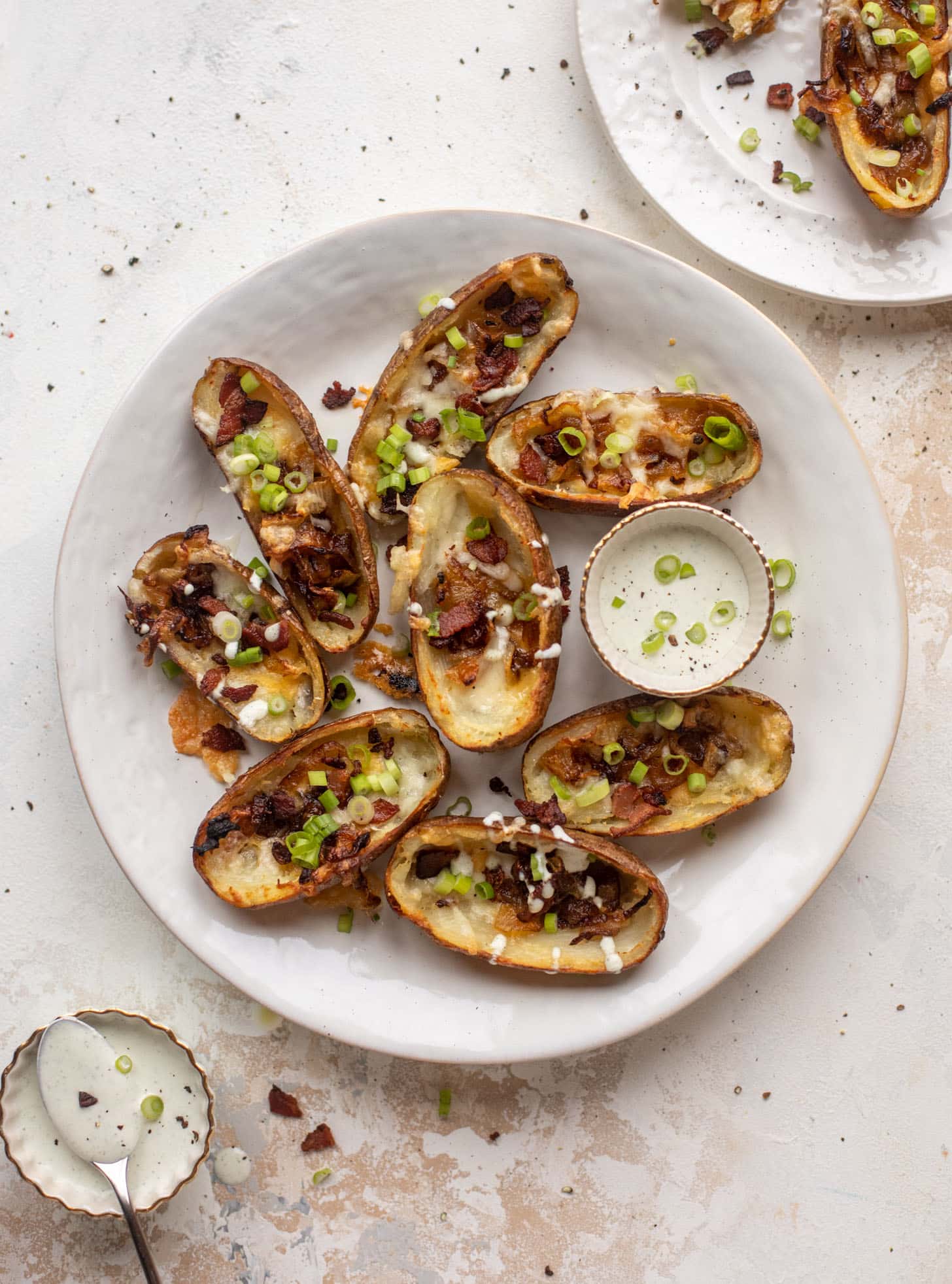 smoked cheddar and caramelized onion potato skins with ranch