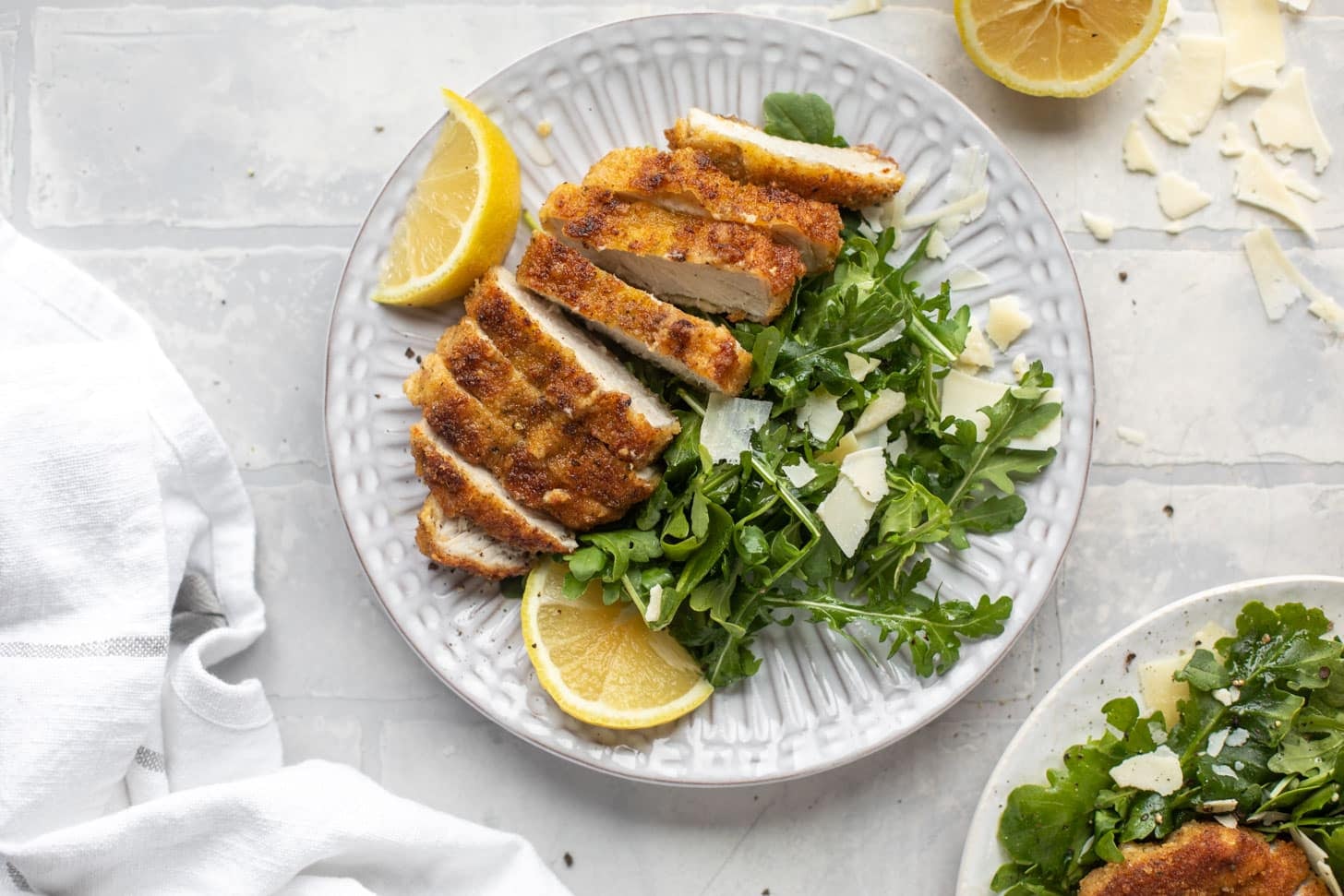 pork milanese with lemon arugula greens
