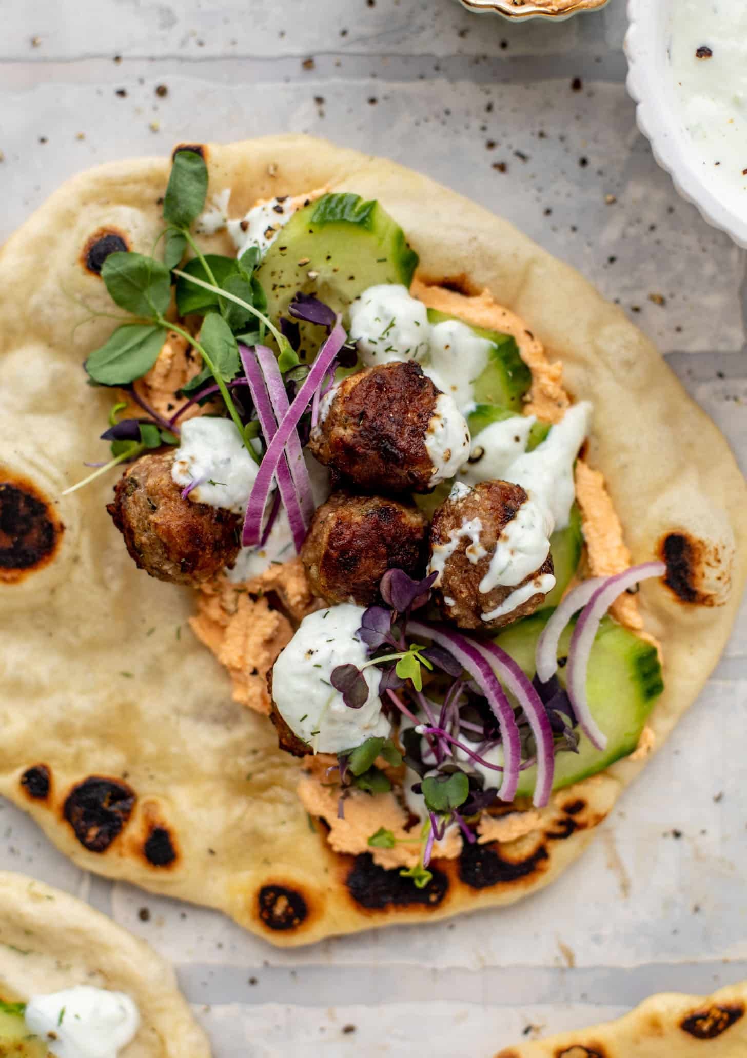 chicken meatball pitas with roasted red pepper whipped feta