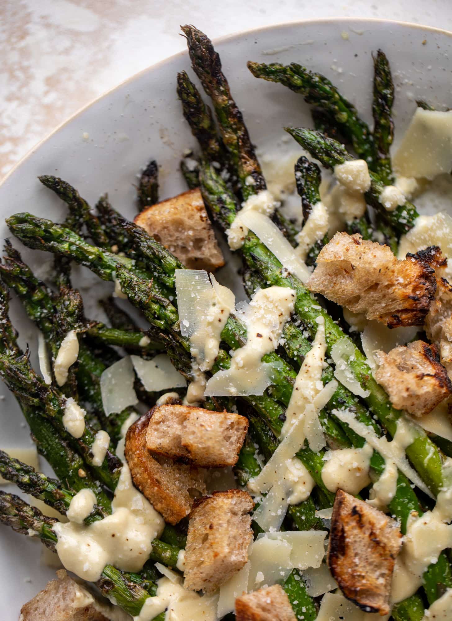 grilled asparagus caesar with sourdough croutons