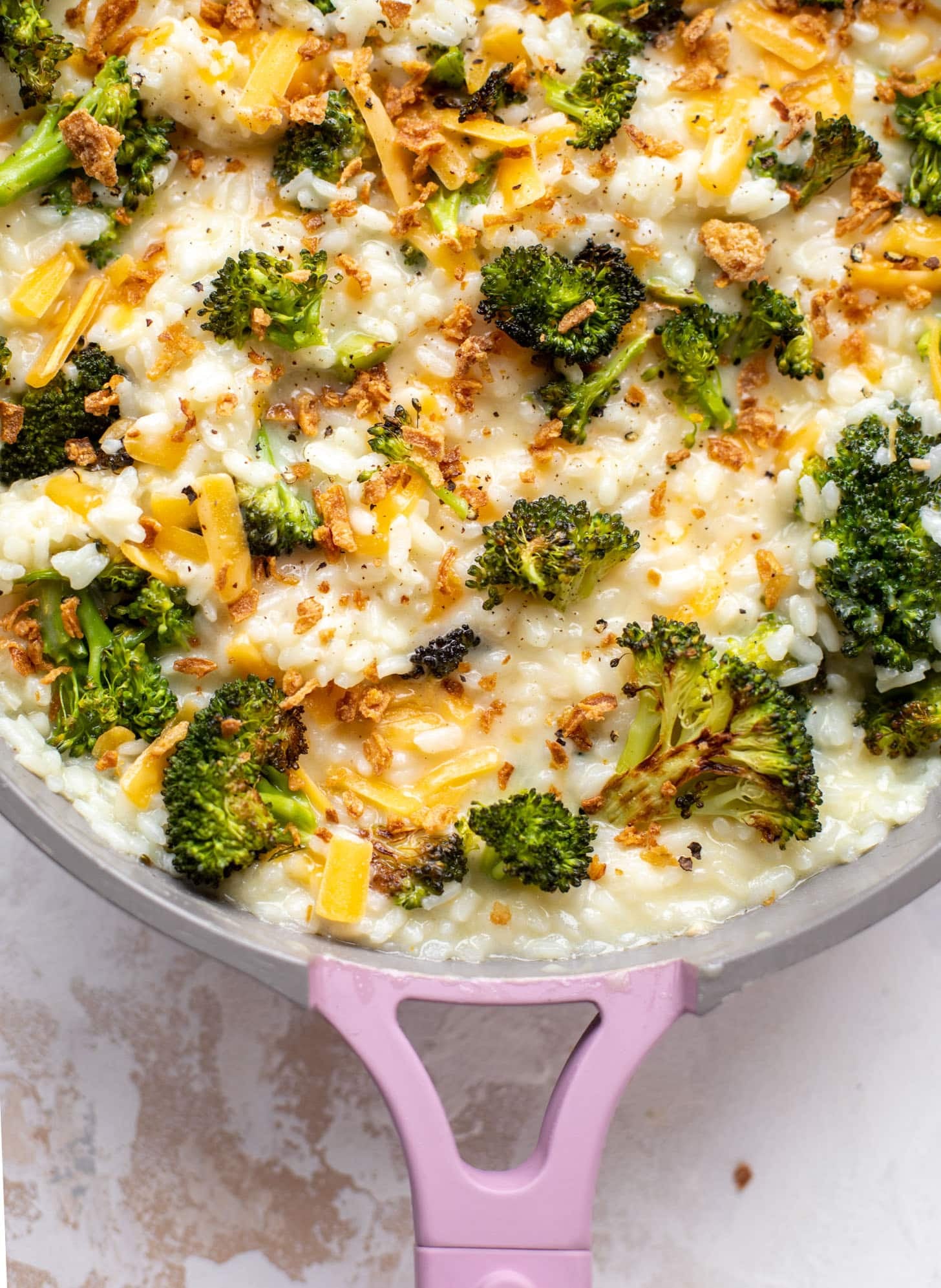 roasted broccoli cheddar risotto with crispy onions